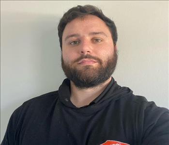 headshot of a man with a beard